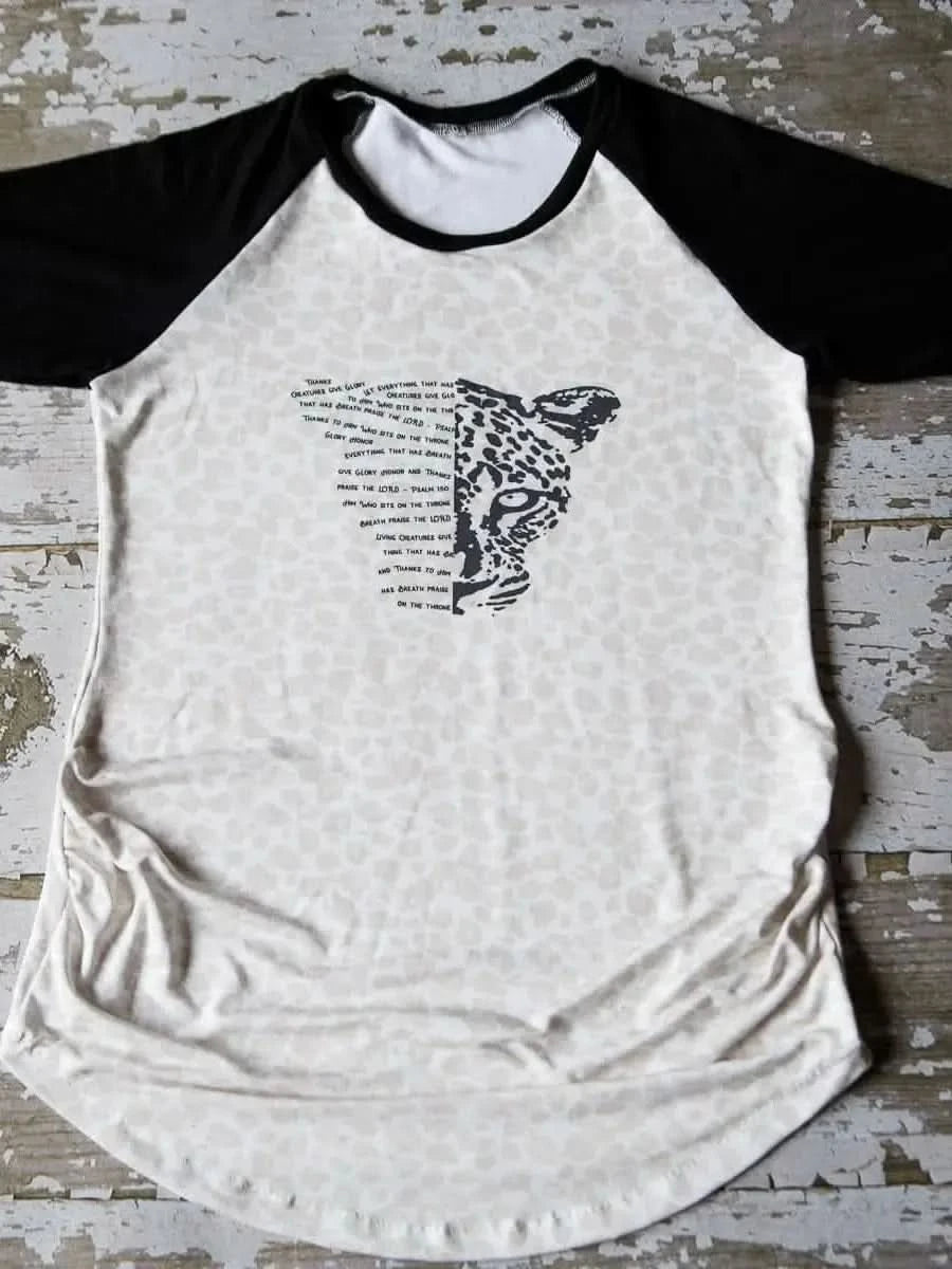 Faith-based fabric panel with tiger face and "Creatures Give Glory" text.