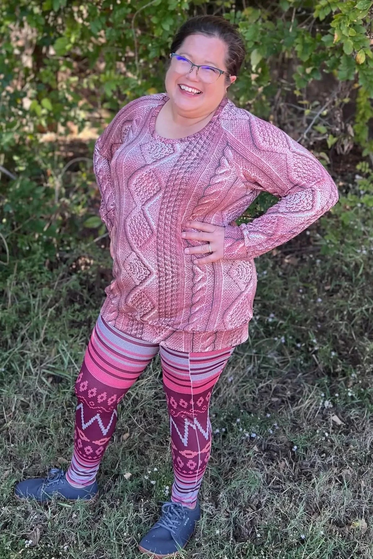 Woman modeling pink abstract patterned outfit made from Glacier Mirage fabric.