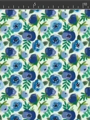 Blue buttercups floral fabric with white background and green leaves.
