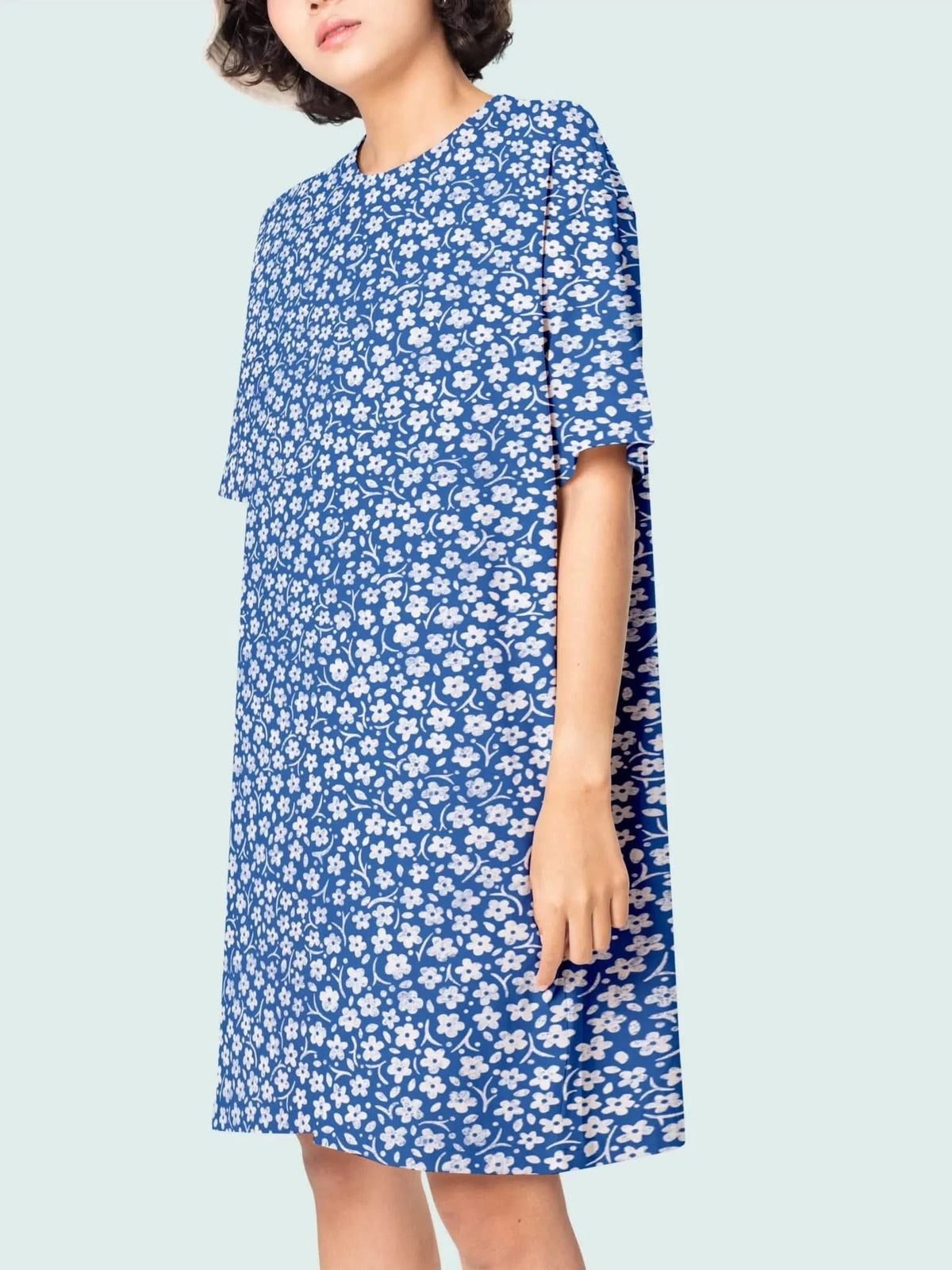 Blue floral patterned fabric from WayMaker Fabrics.