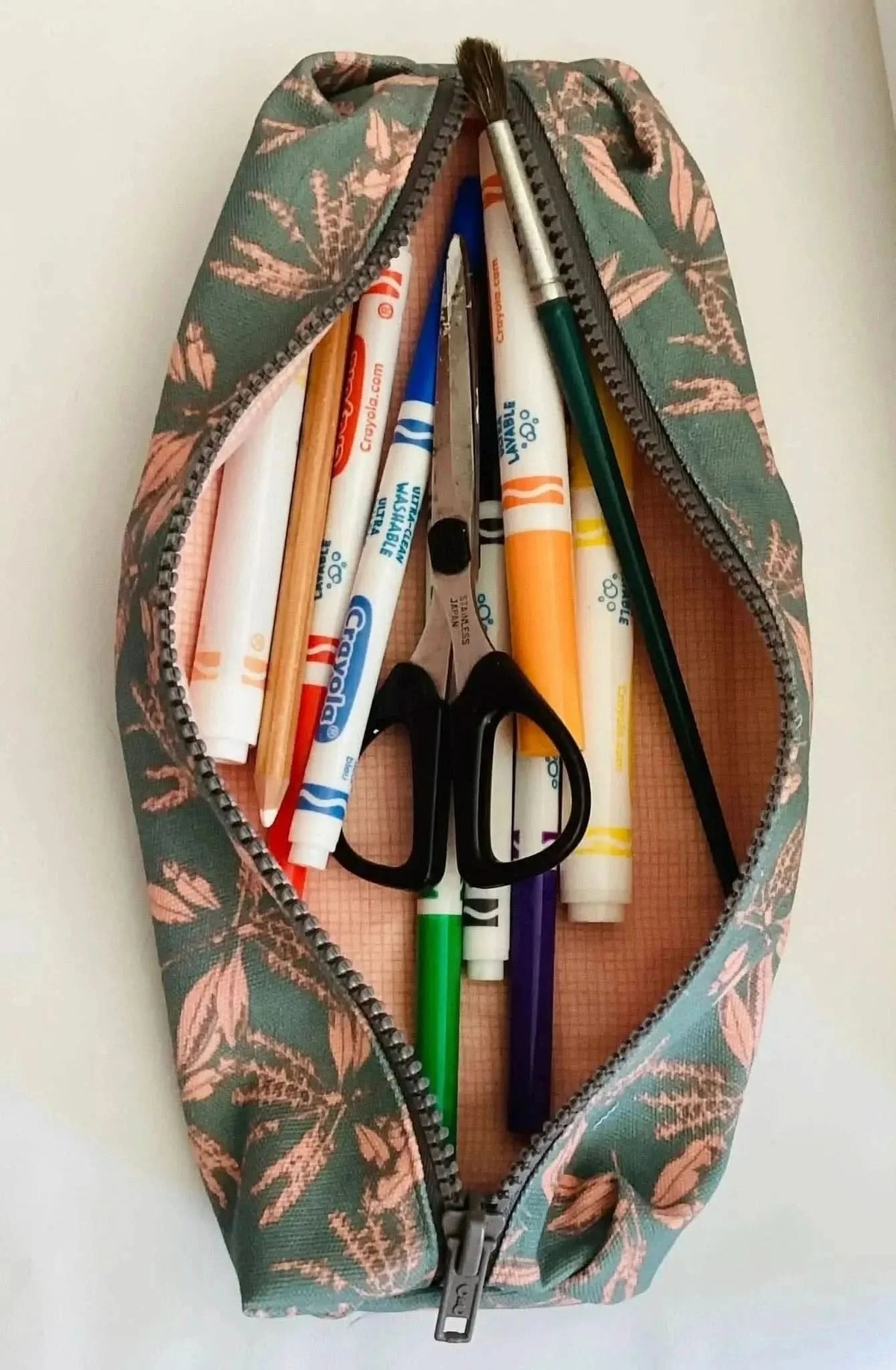 Blush hollow floral print fabric from WayMaker Fabrics, shown in a sewing project.