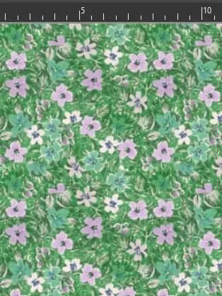 Green fabric with a floral print of purple, white, and teal flowers.