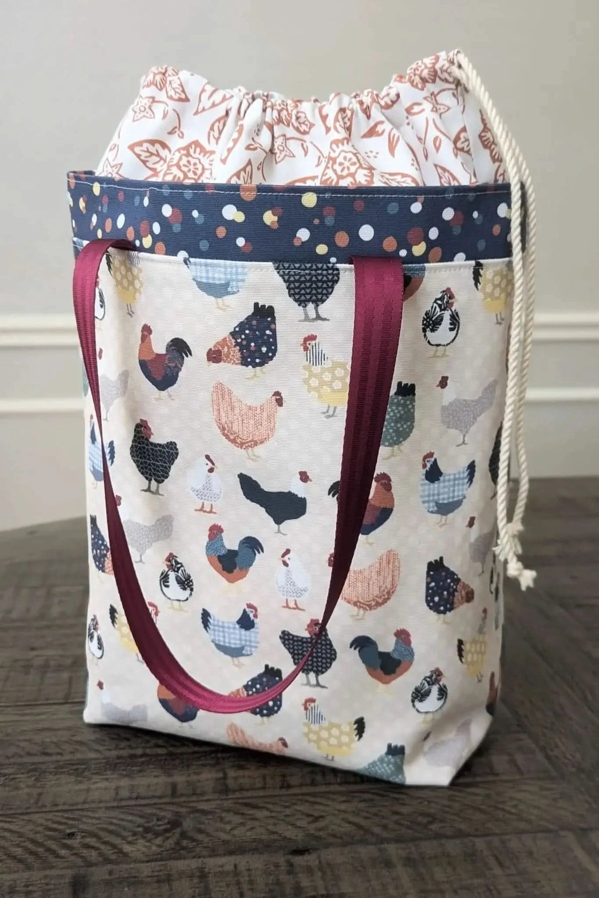 Patchwork tote bag made from WayMaker Fabrics chicken print fabric with drawstring top.