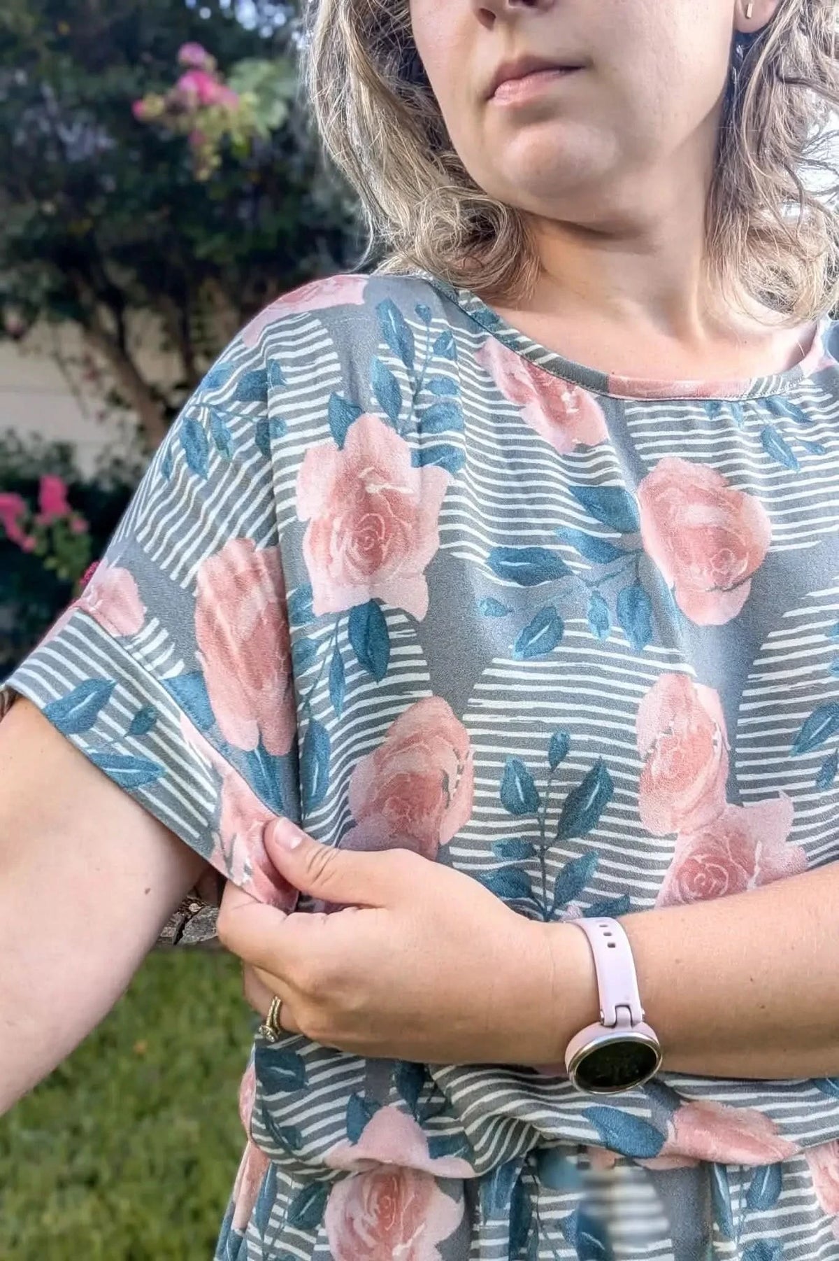 Wild Rose floral print fabric with pink roses on gray background.