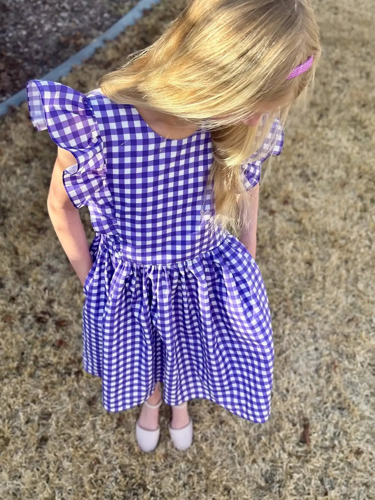Violet gingham fabric with purple and white checkered pattern.