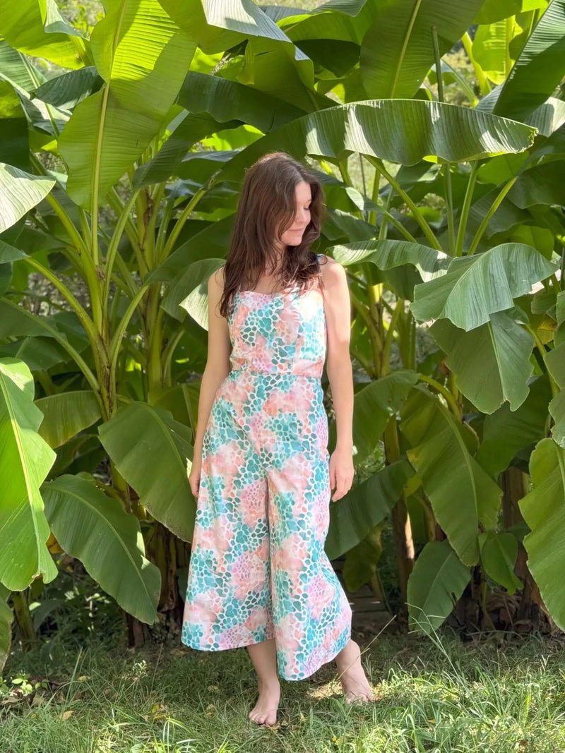 Vibrant abstract print fabric in wild heart pattern on colorful background.