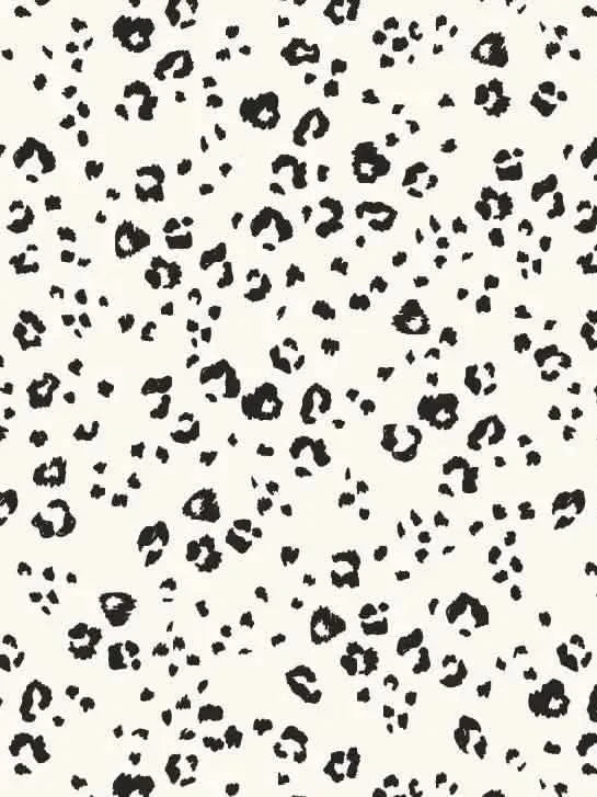 Mono leopard print fabric with black spots on a white background.