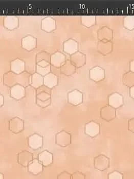 Peach geometric fabric with overlapping hexagon print.