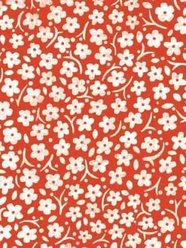Red fabric with scattered white floral botanical print by Rachel Getz Designs.