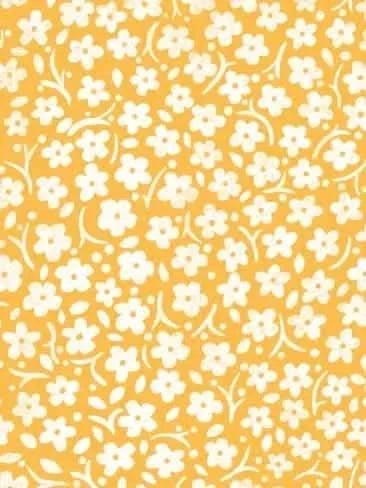 Orange fabric with a repeating pattern of small white flowers and leaves.