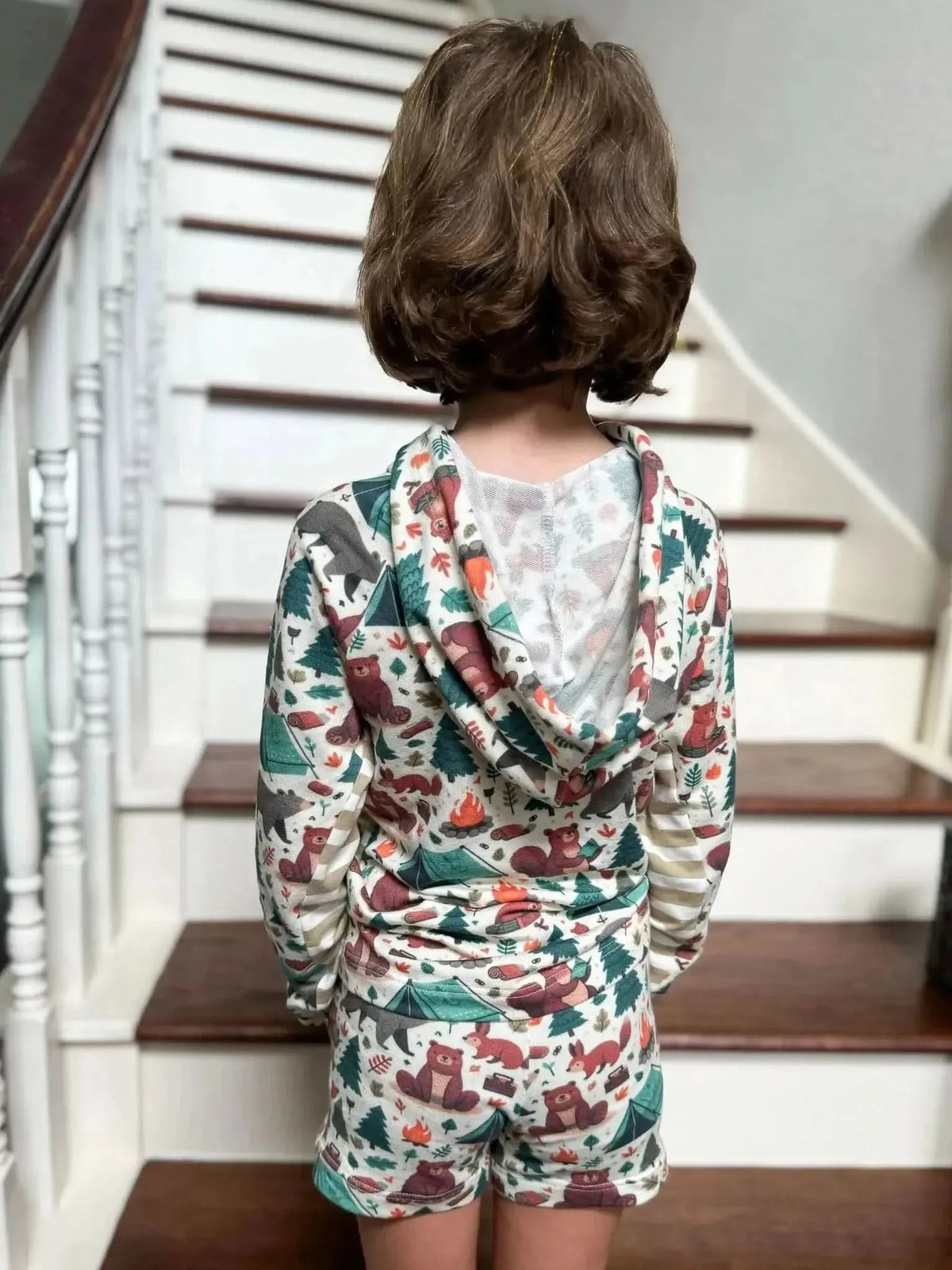 Child's green hoodie and shorts set with woodland bears and camping print.