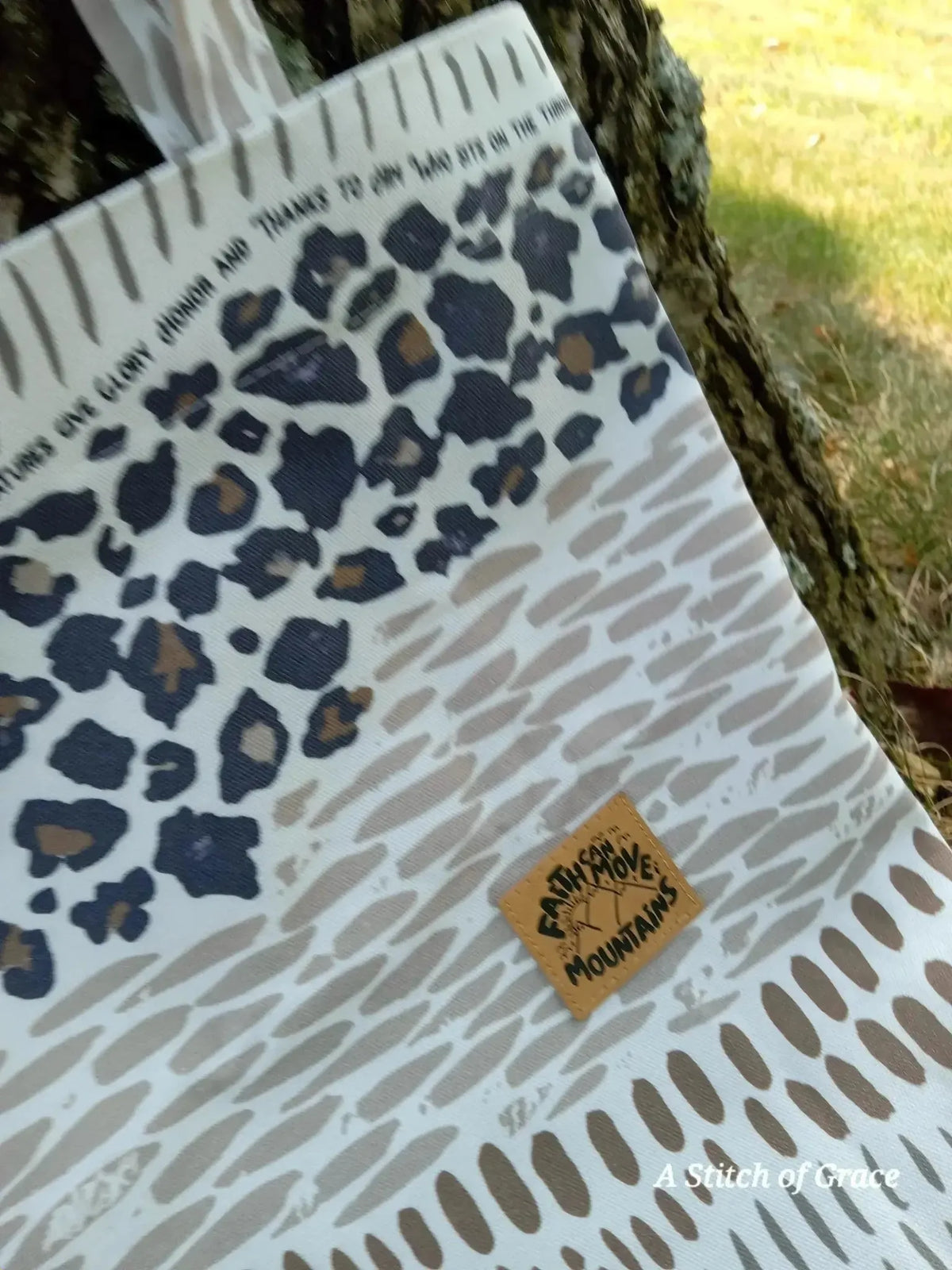 Fabric with "Everything that has Breath" faith-based leopard print and WayMaker Fabrics label.