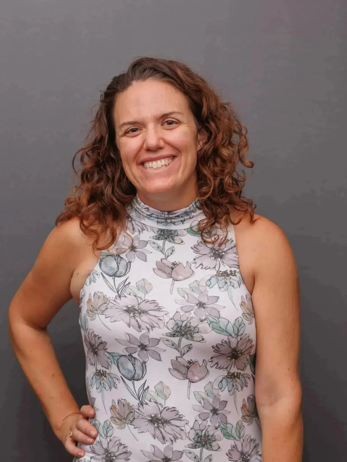 Grey Lane watercolor floral fabric with white flowers on gray background.