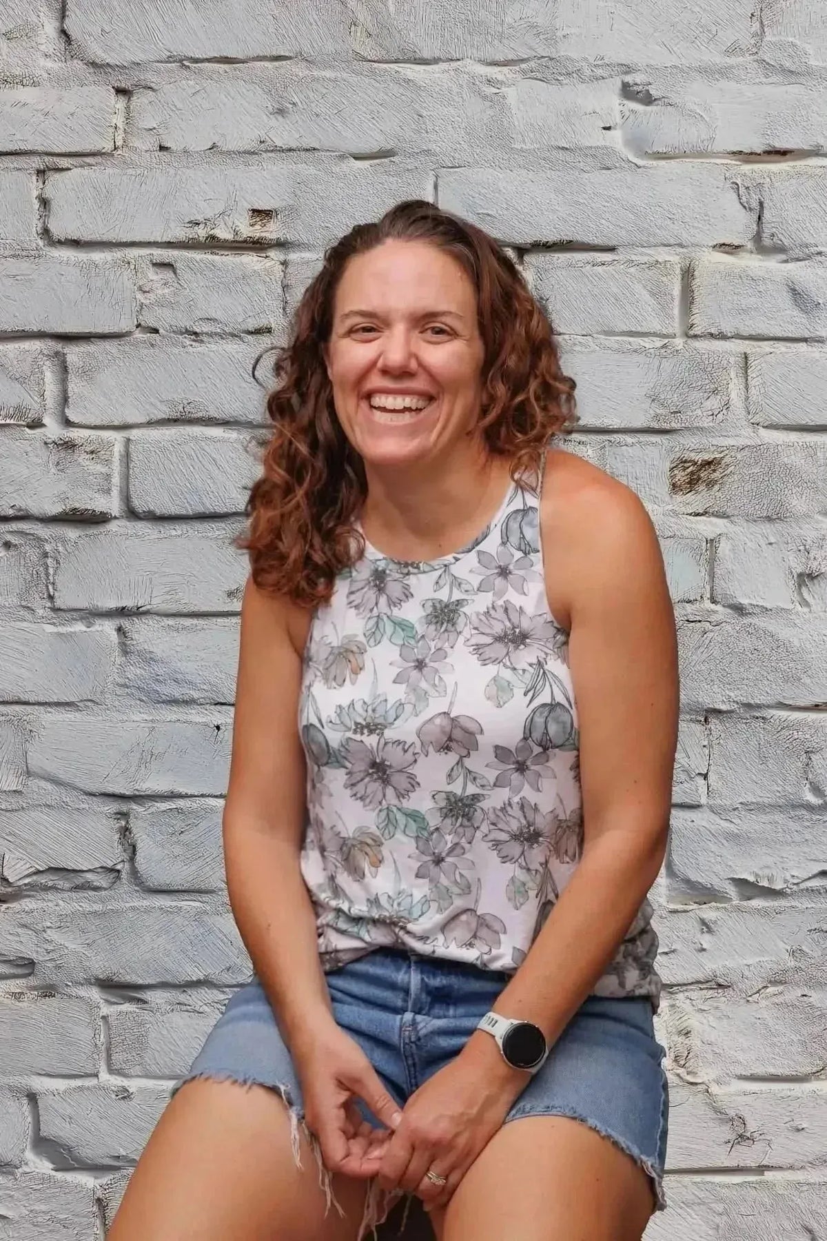 Grey Lane watercolor floral fabric with pink flowers on a white background.