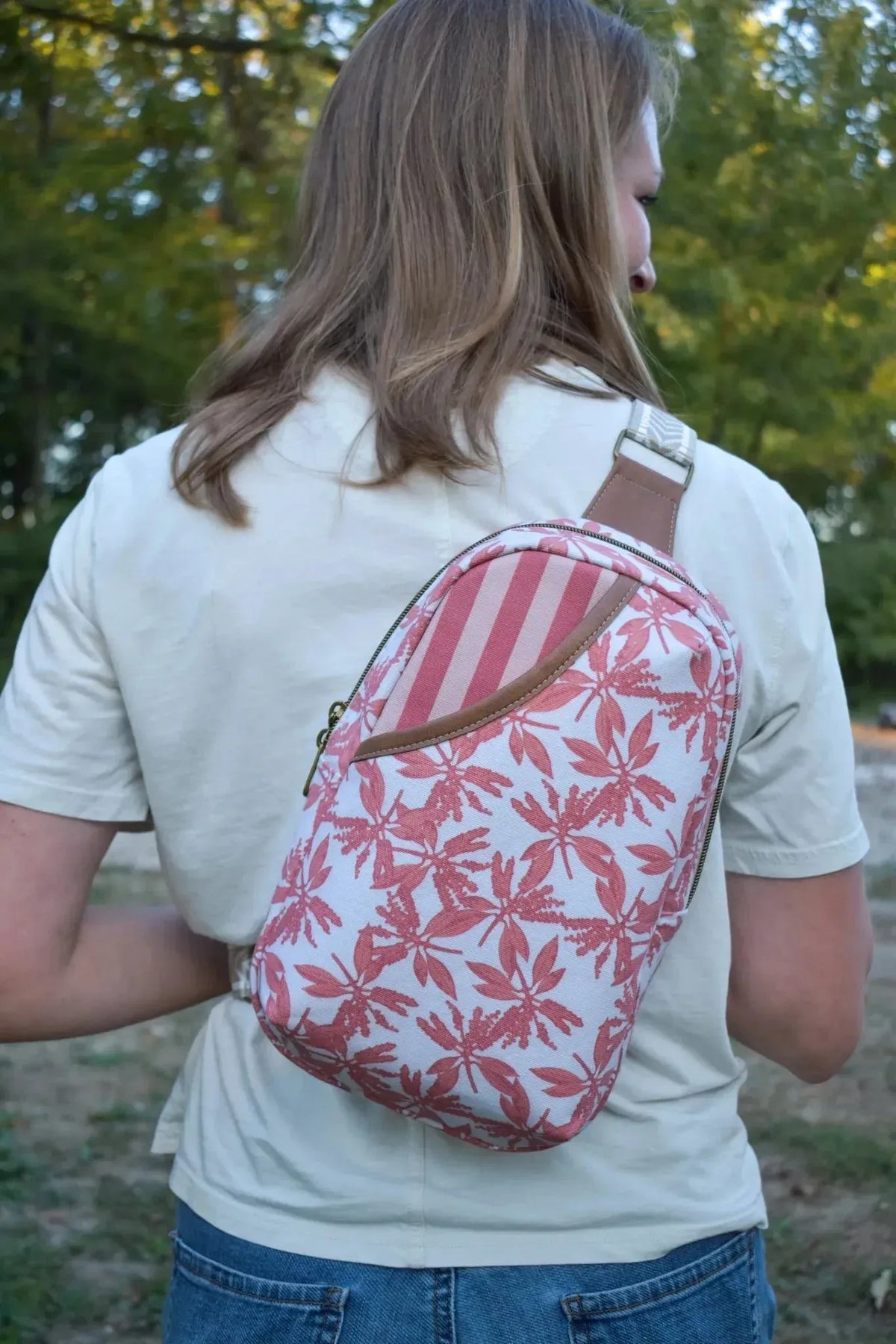 Pink leaves print fabric with autumn floral pattern in Amber Grove style.