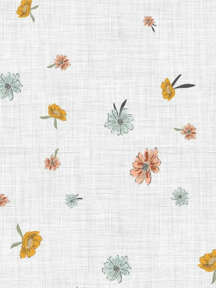 White fabric with scattered small flowers in orange, yellow, and light blue.