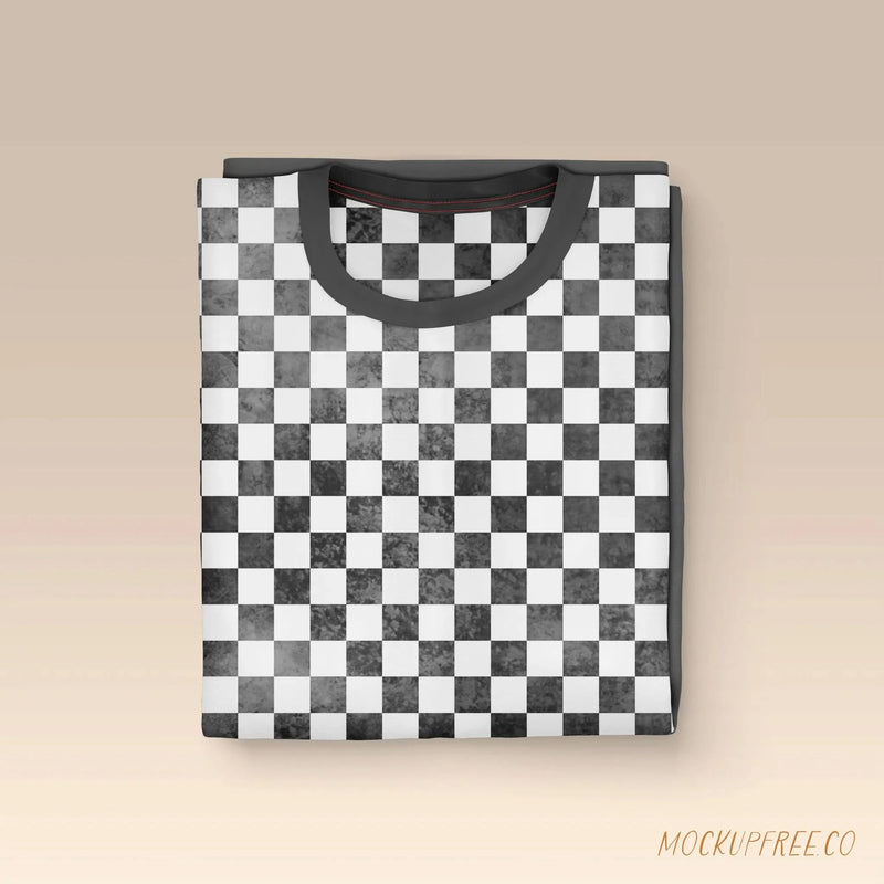 Folded t-shirt with a black and white checkerboard pattern.