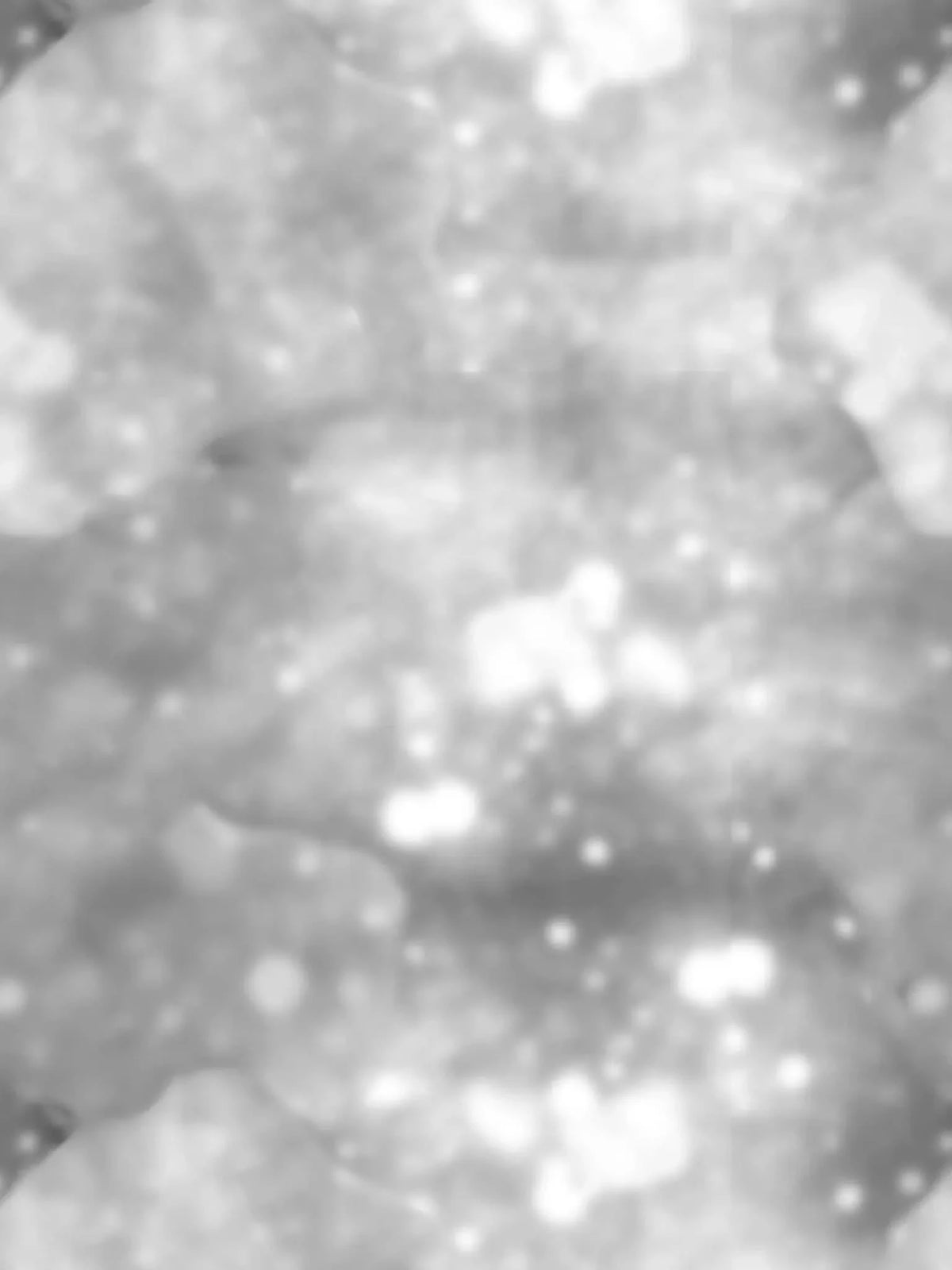 Blurred silver glitter pattern.