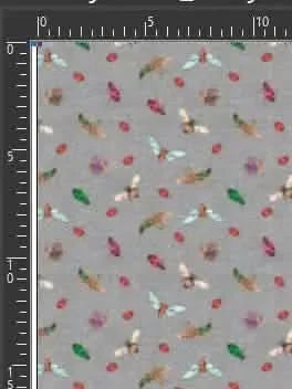 A gray fabric with a repeating pattern of various colorful insects and leaves.
