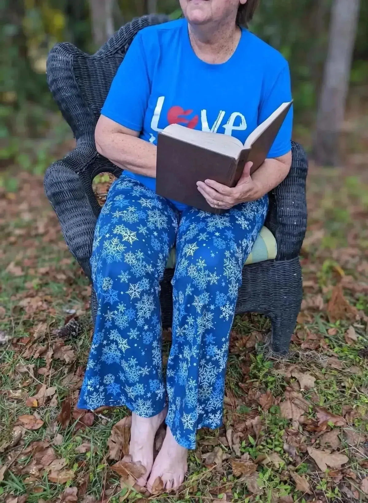 Blue snowflake print fabric used in a woman's cozy pajama set.