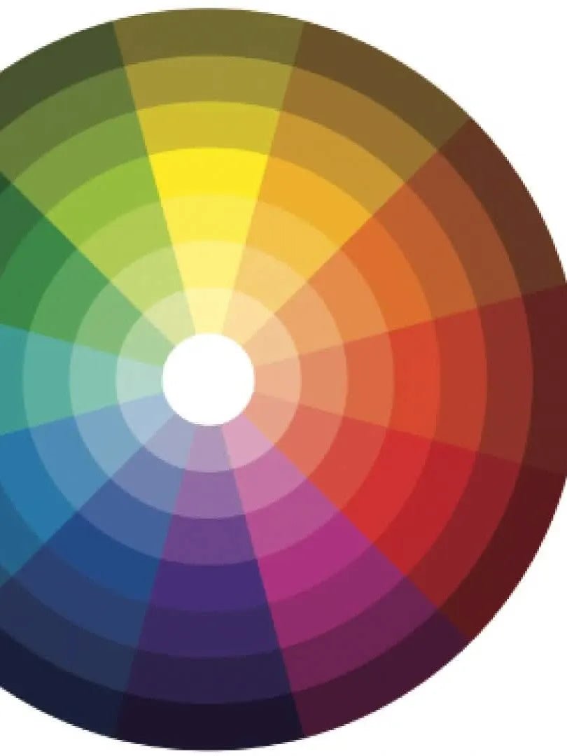 A color wheel with various hues and shades, arranged in concentric circles.