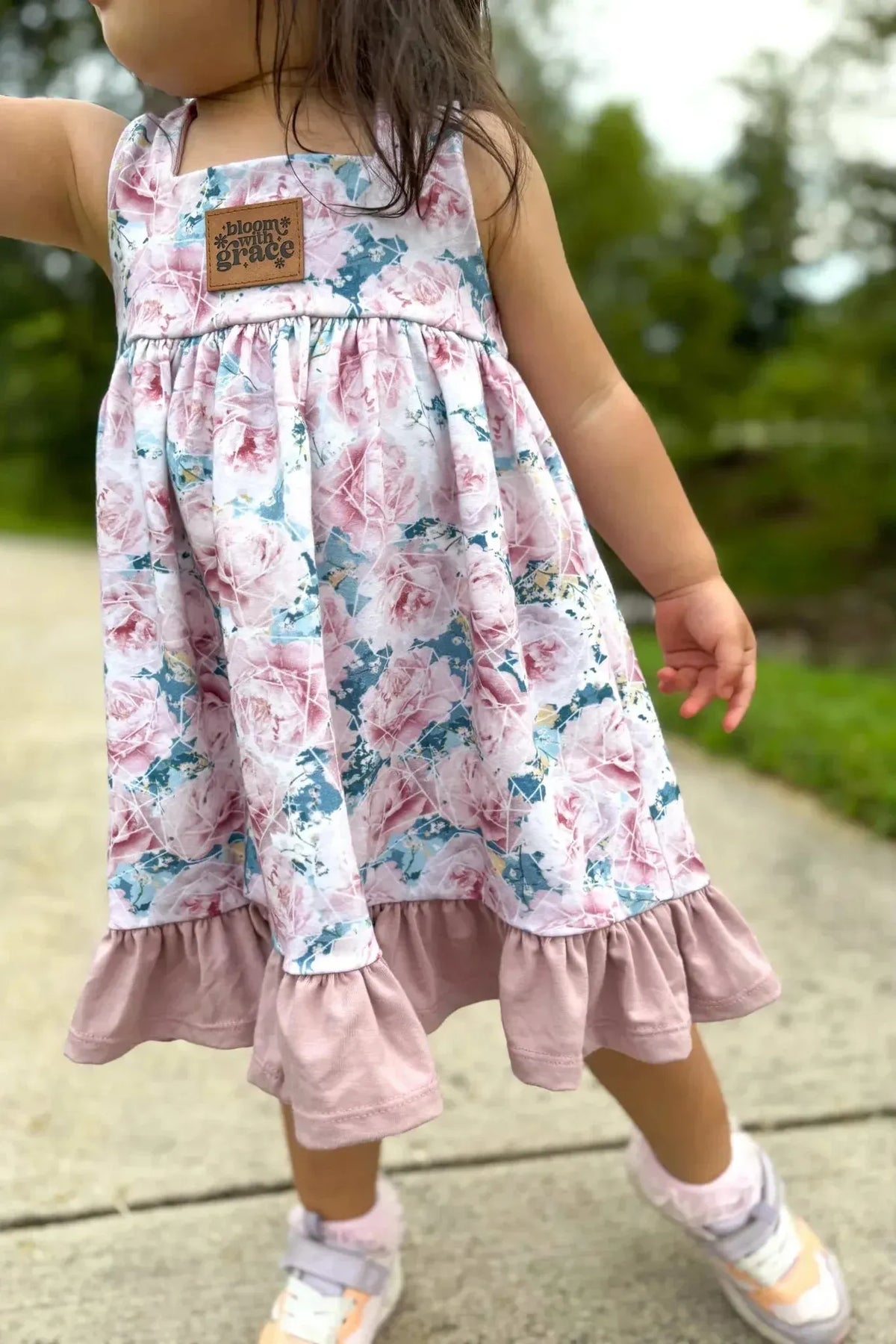 Pink and blue rose print floral fabric with a faith-based sanctuary design.