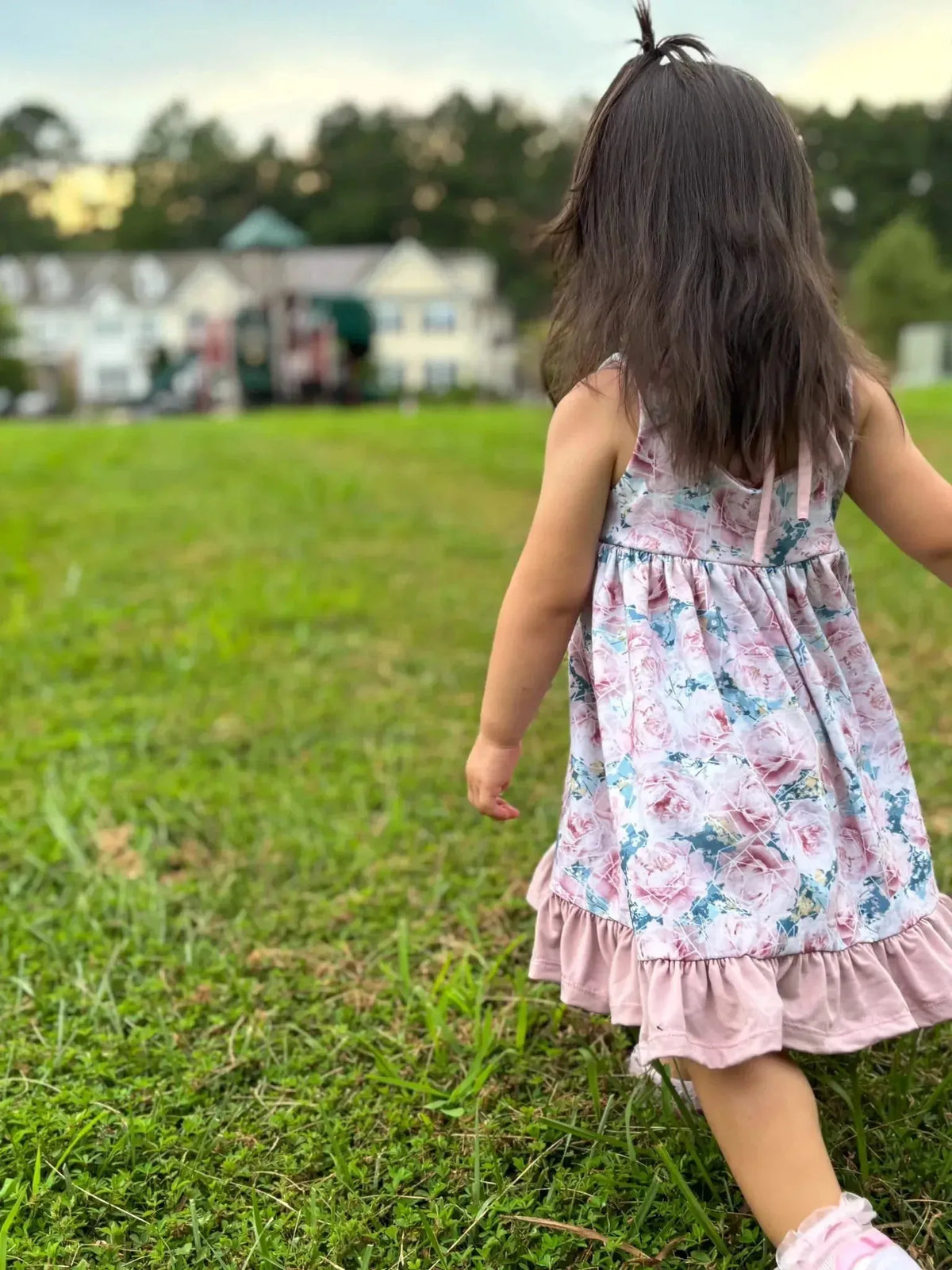 Pink and blue rose floral print fabric with subtle color variations.