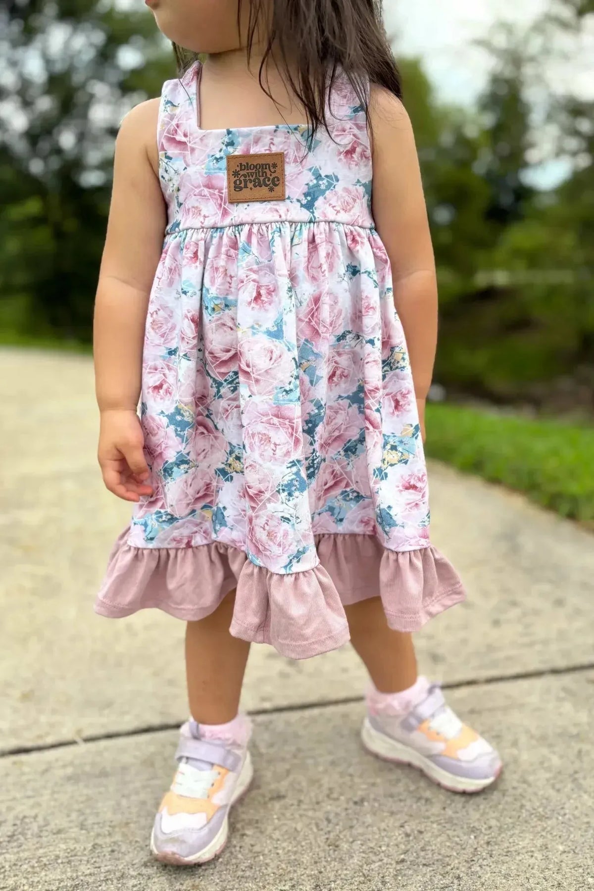 Pink and blue rose print floral fabric with subtle color variations.