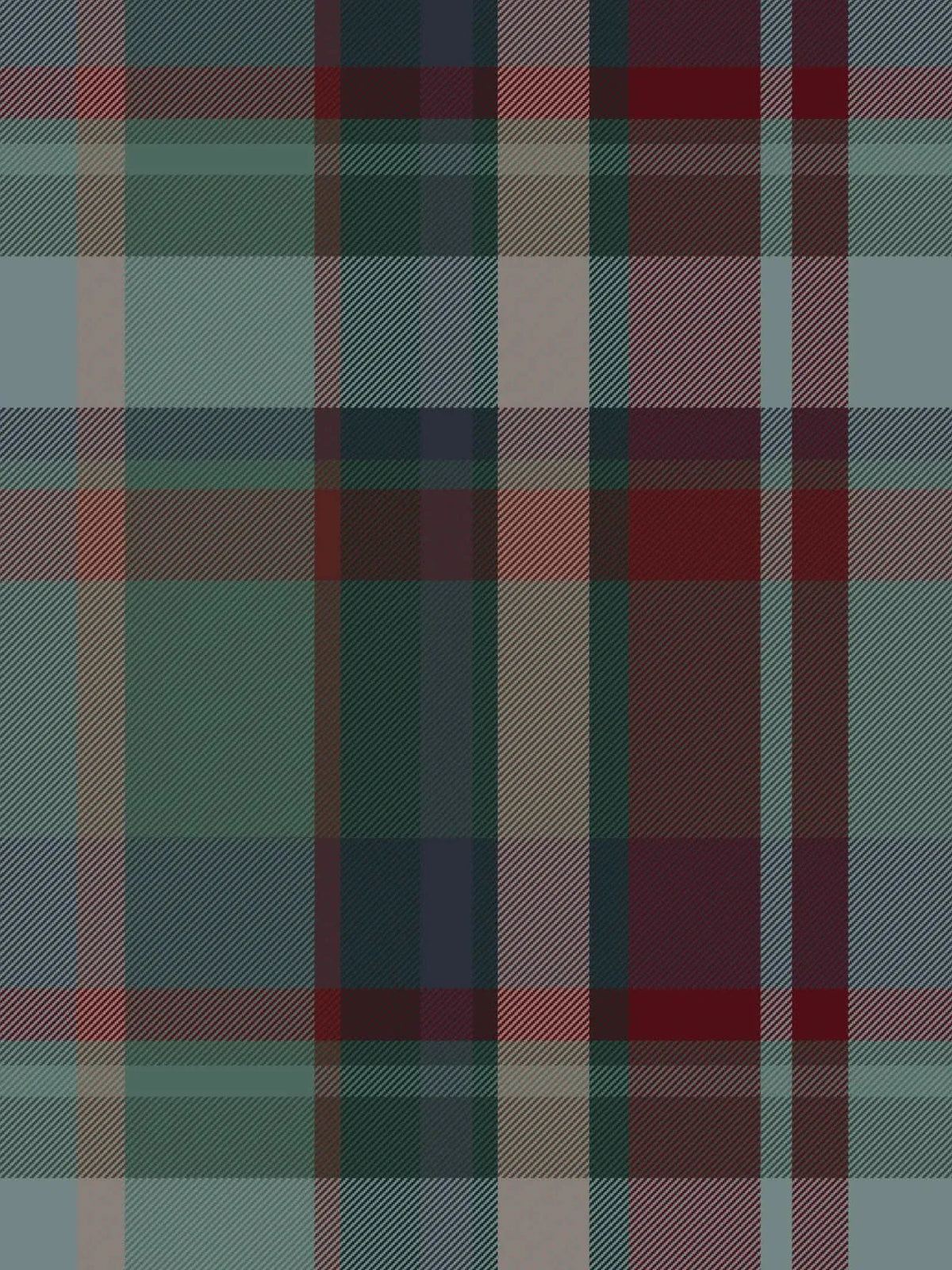 A dark Christmas plaid fabric with red, green, and blue tones.