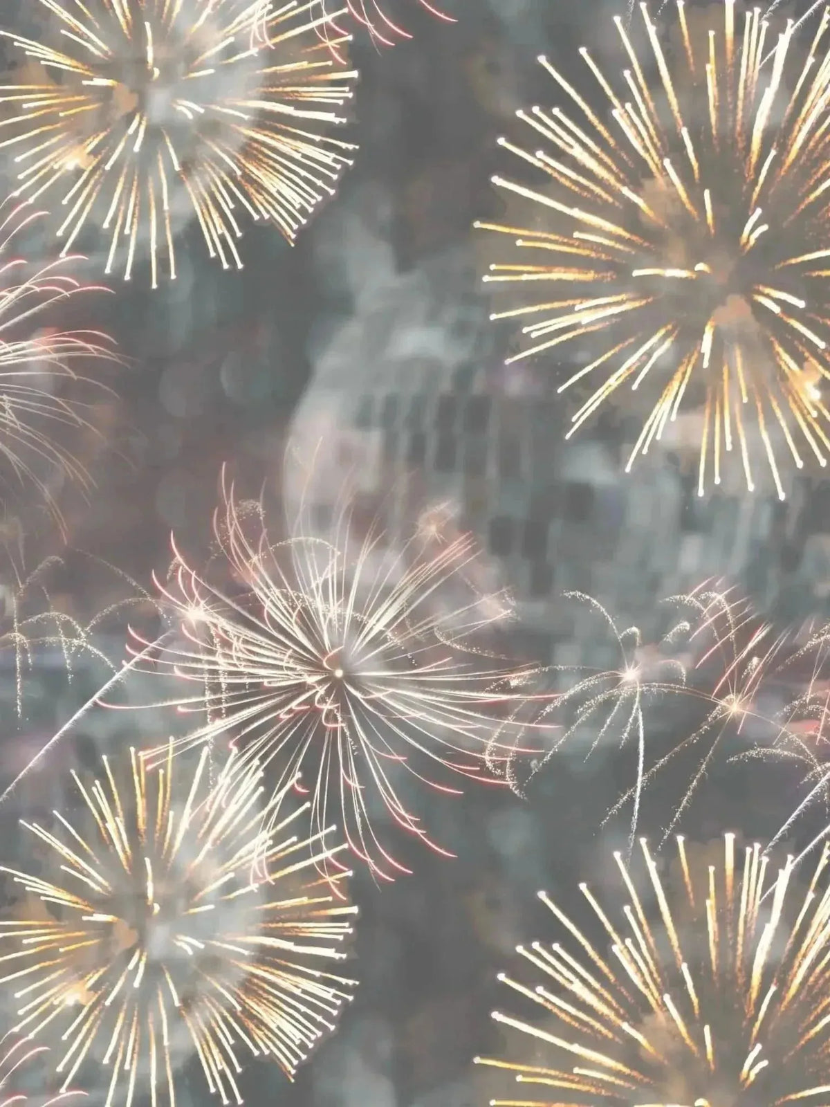 Fabric with a festive print of golden fireworks exploding over a blurred cityscape.