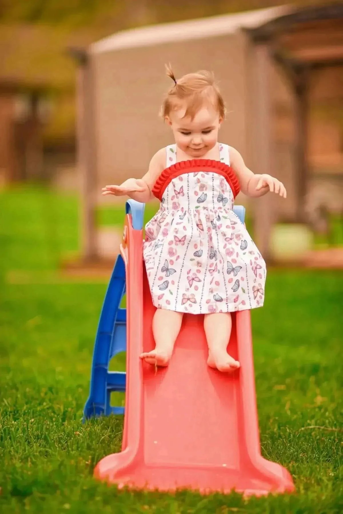 White fabric with red buggy stripe print in insect theme.