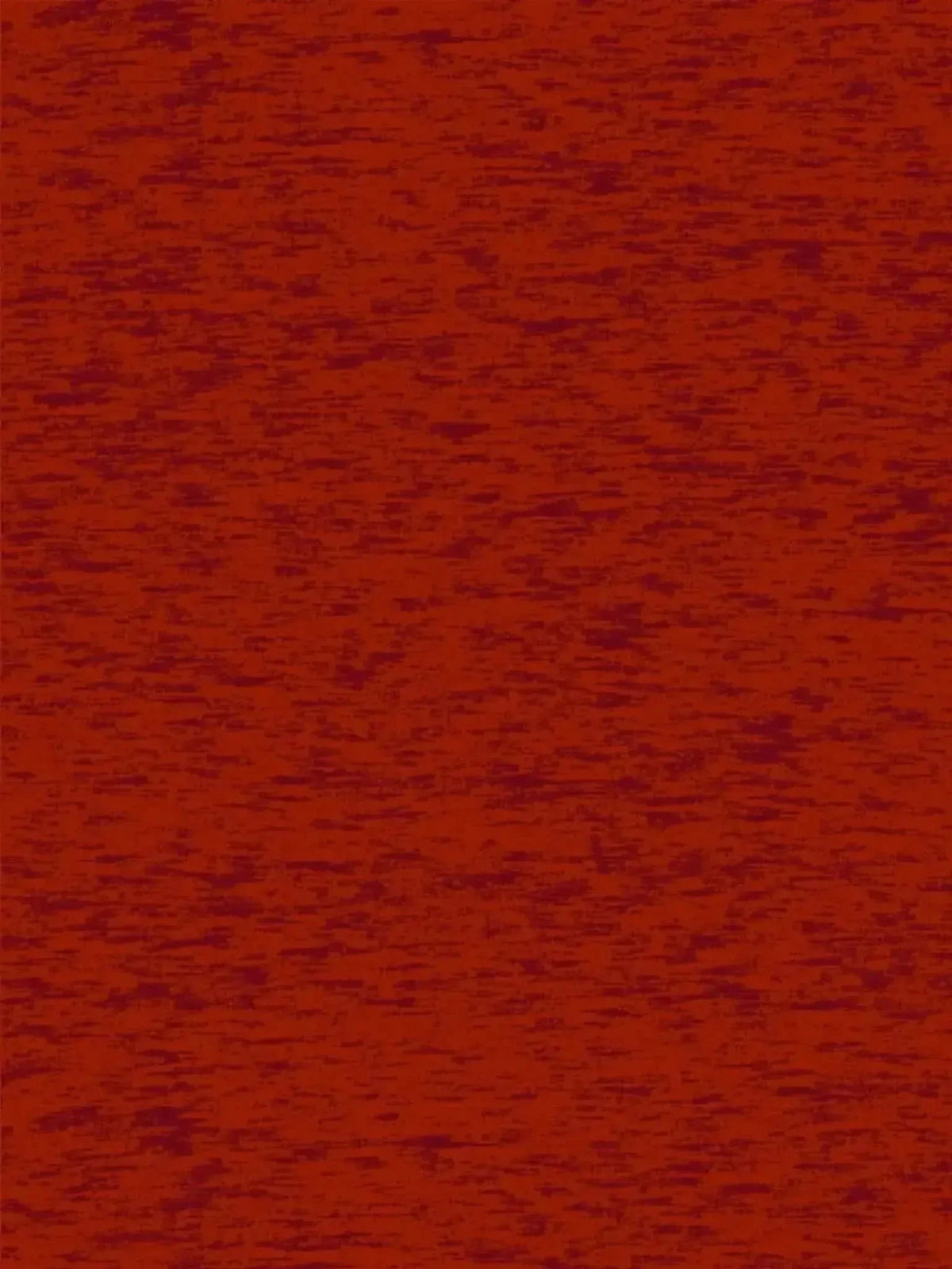 Close-up of red modal jersey fabric with textured weave.