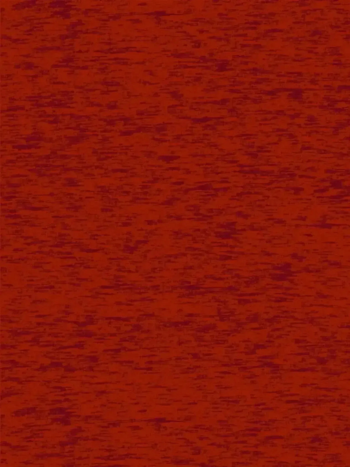 Close-up of red modal jersey fabric with textured weave.