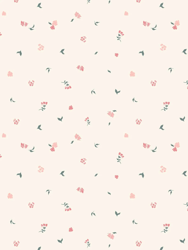 Fabric with a blush background and scattered small pink flowers and green leaves.
