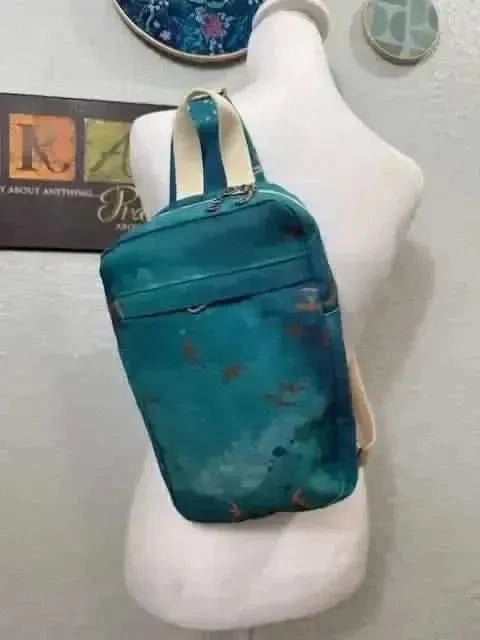 Dark teal fabric with sunset flight bird print from WayMaker Fabrics.