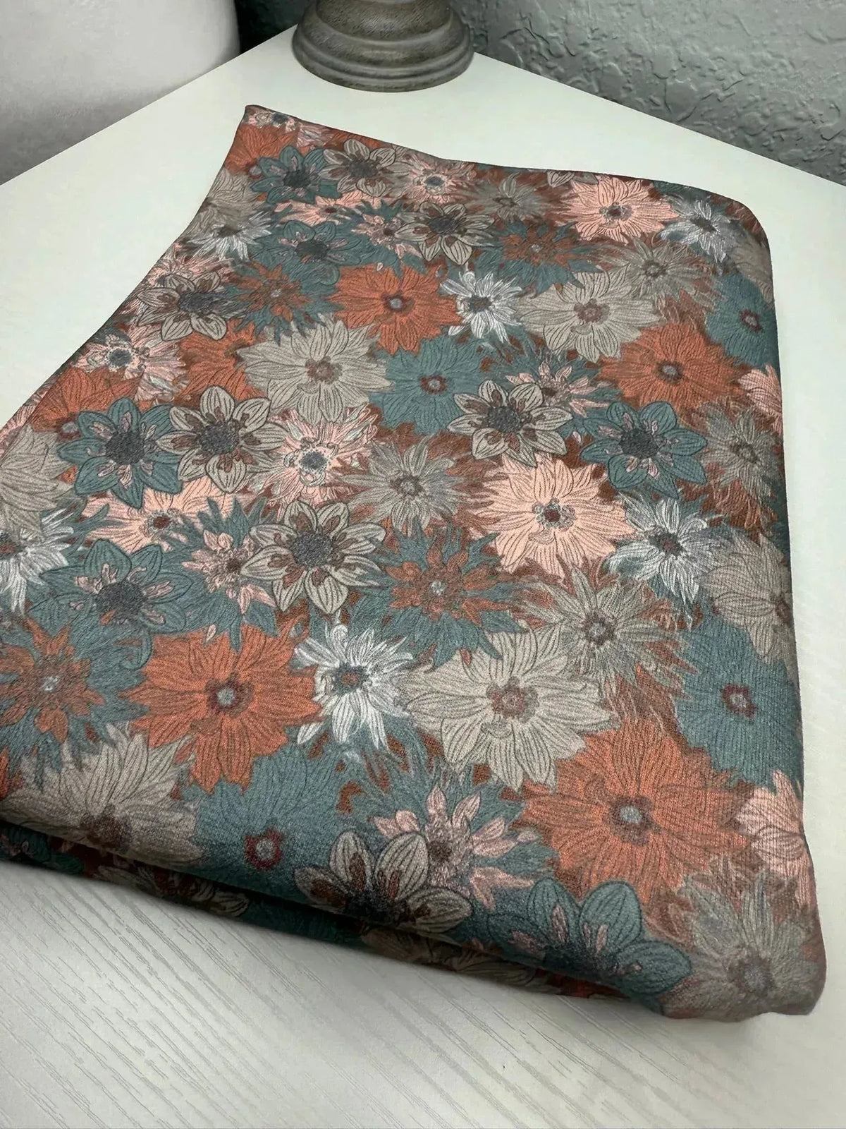 Morning Glory floral print fabric with blue, pink, and autumn blooms.