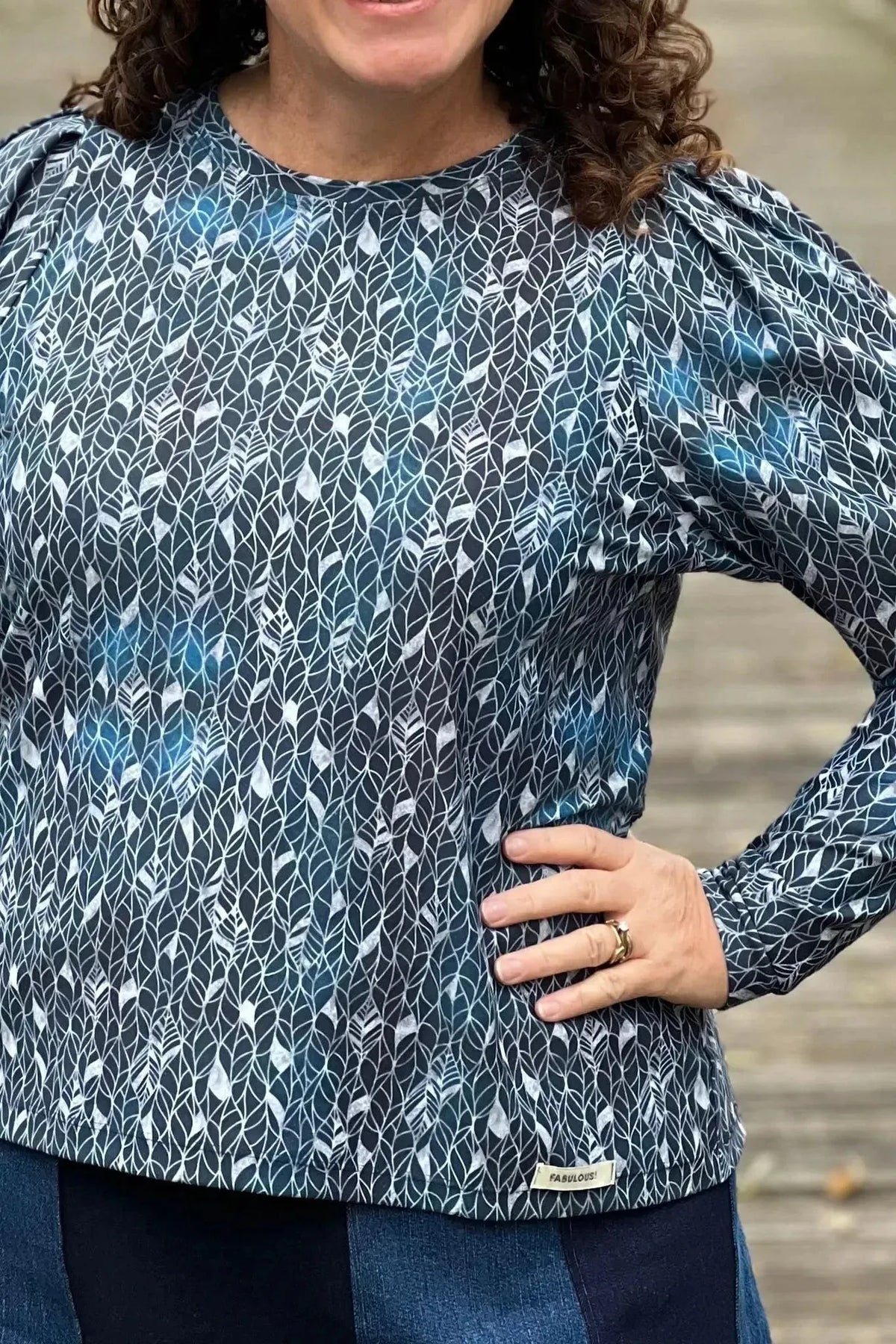 Silver Leaves fabric with abstract leaf pattern print in blue and white tones.