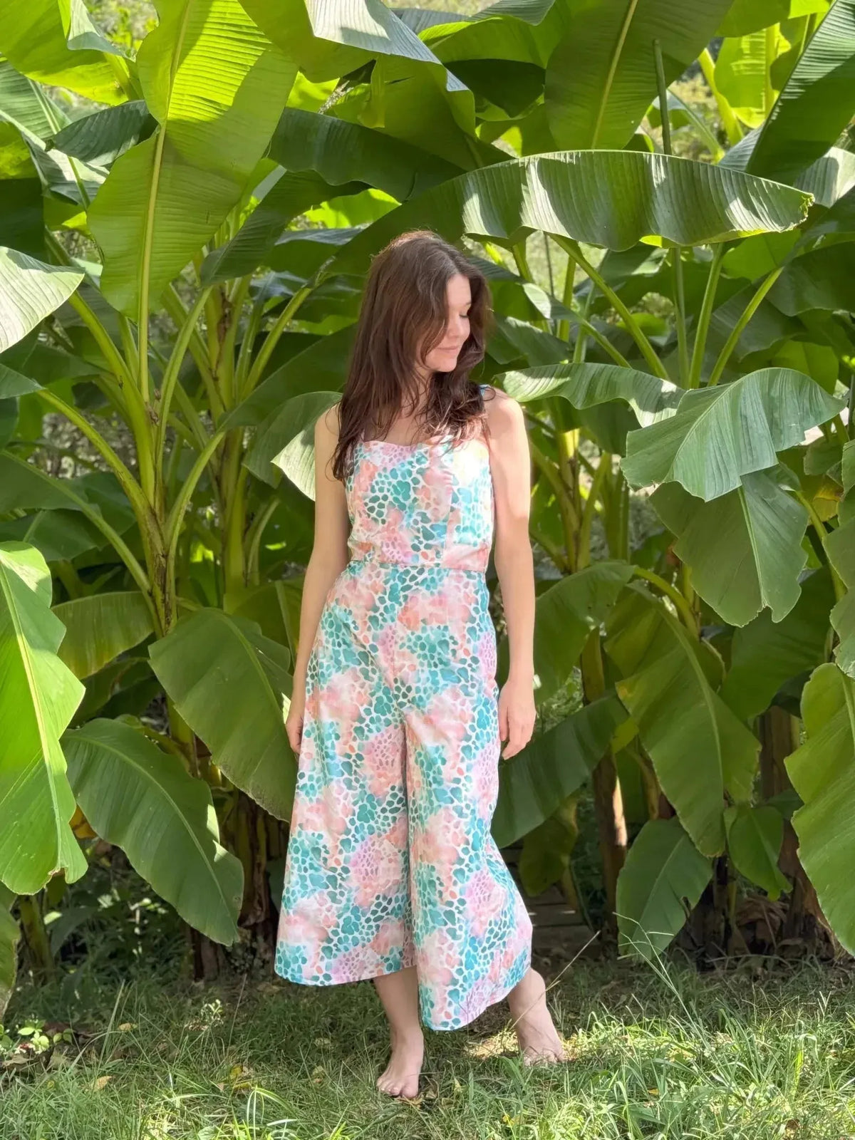 Vibrant abstract print fabric in wild heart pattern on colorful background.