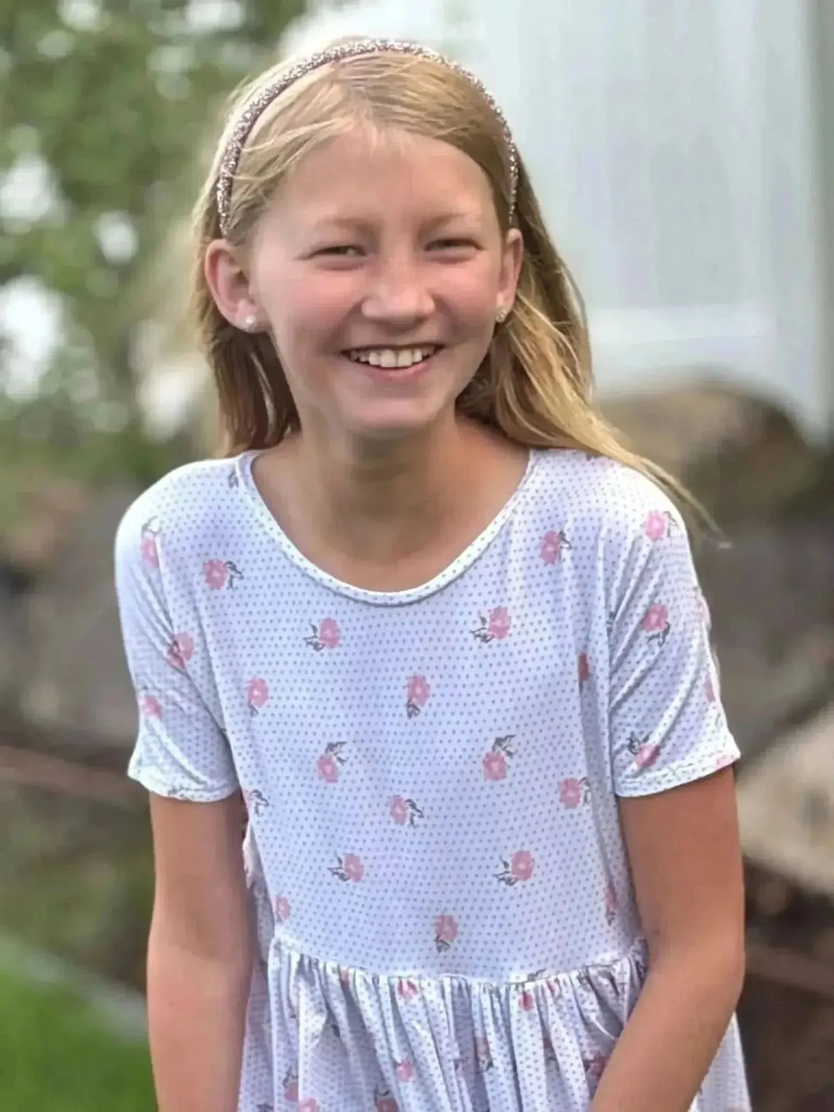 Vintage blooms floral print fabric with pink flowers on white background.