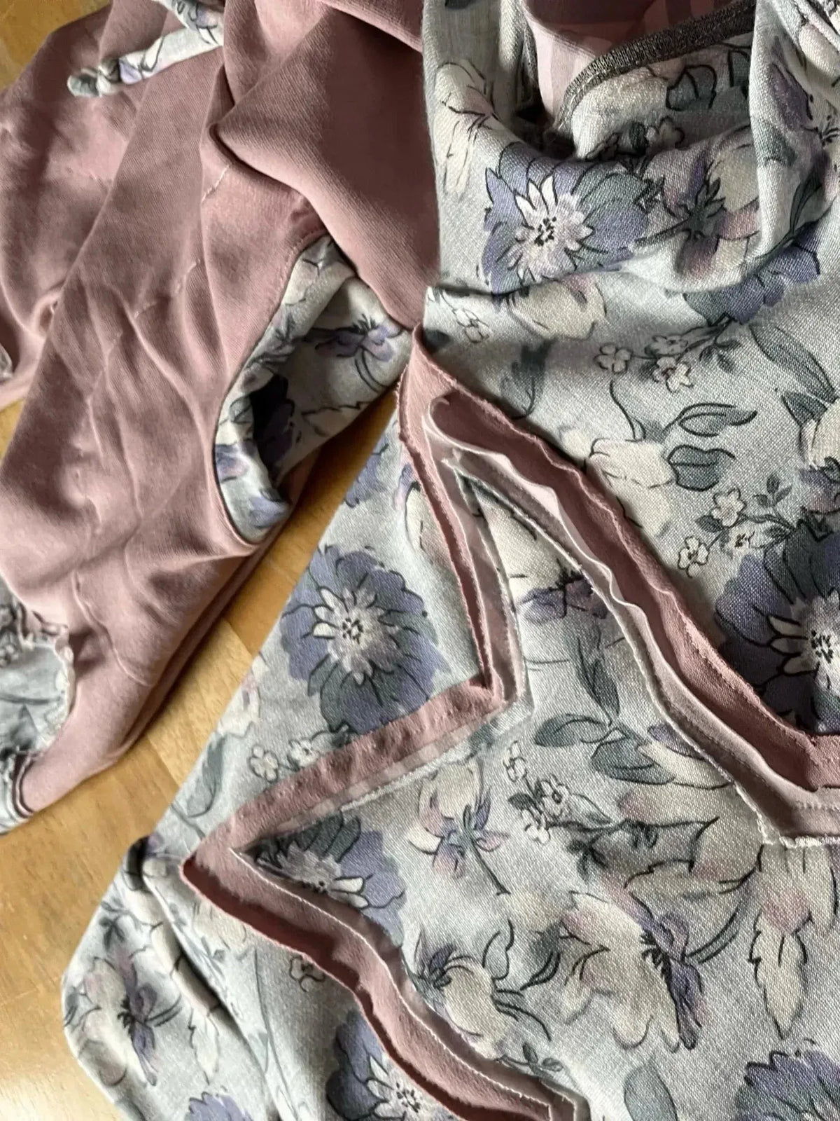 Purple floral print fabric with cornflower meadow pattern in shades of purple and gray.