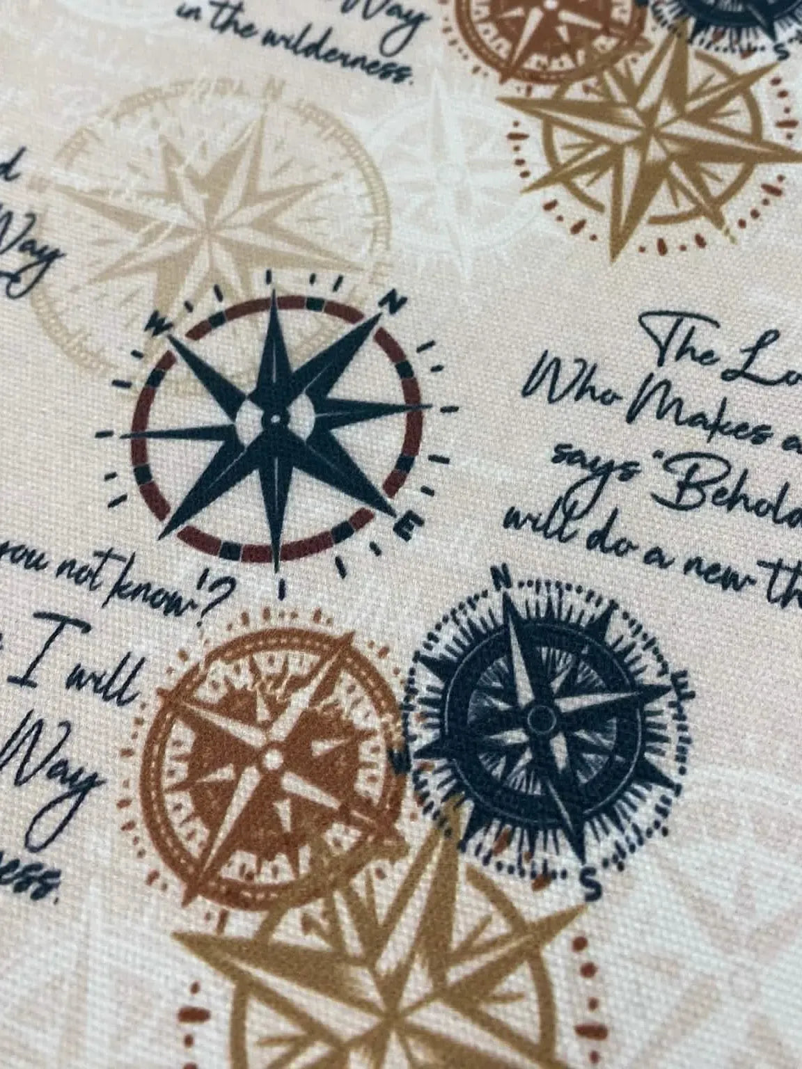 Fabric with compass designs and text that reads "The Lord Who Makes a Way".