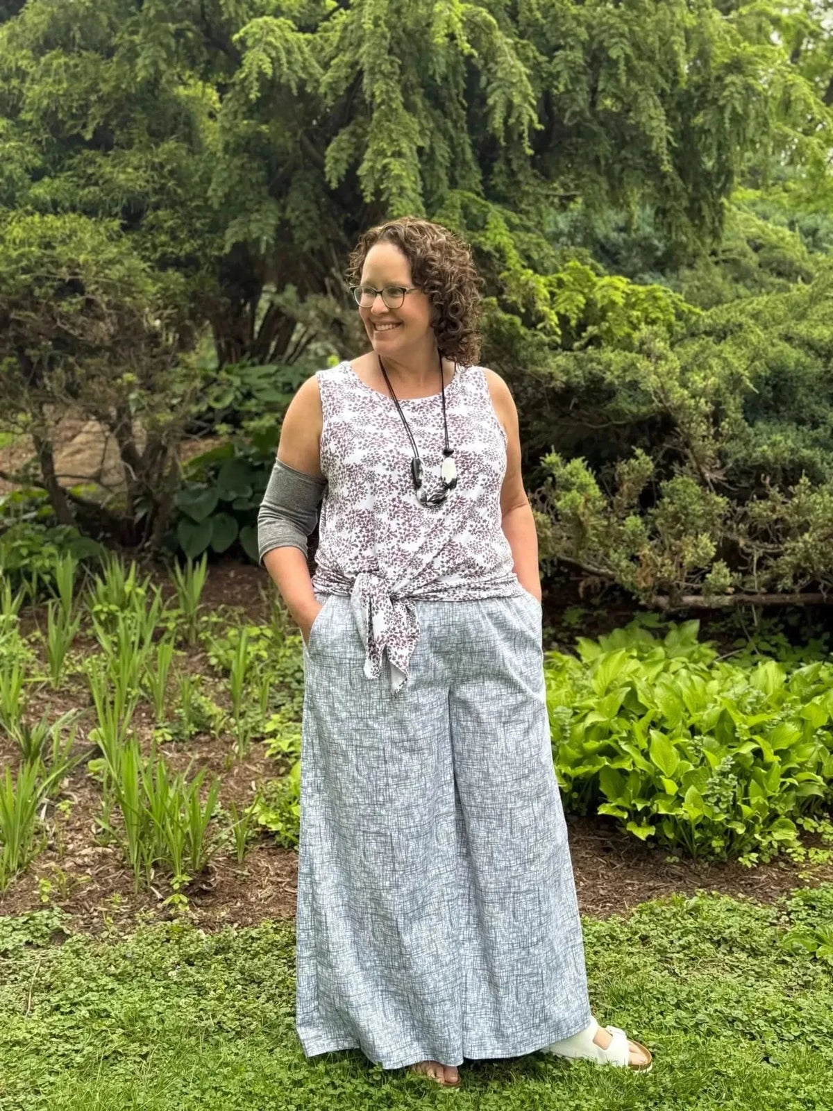 Black hatch abstract print fabric with gray and white geometric pattern.