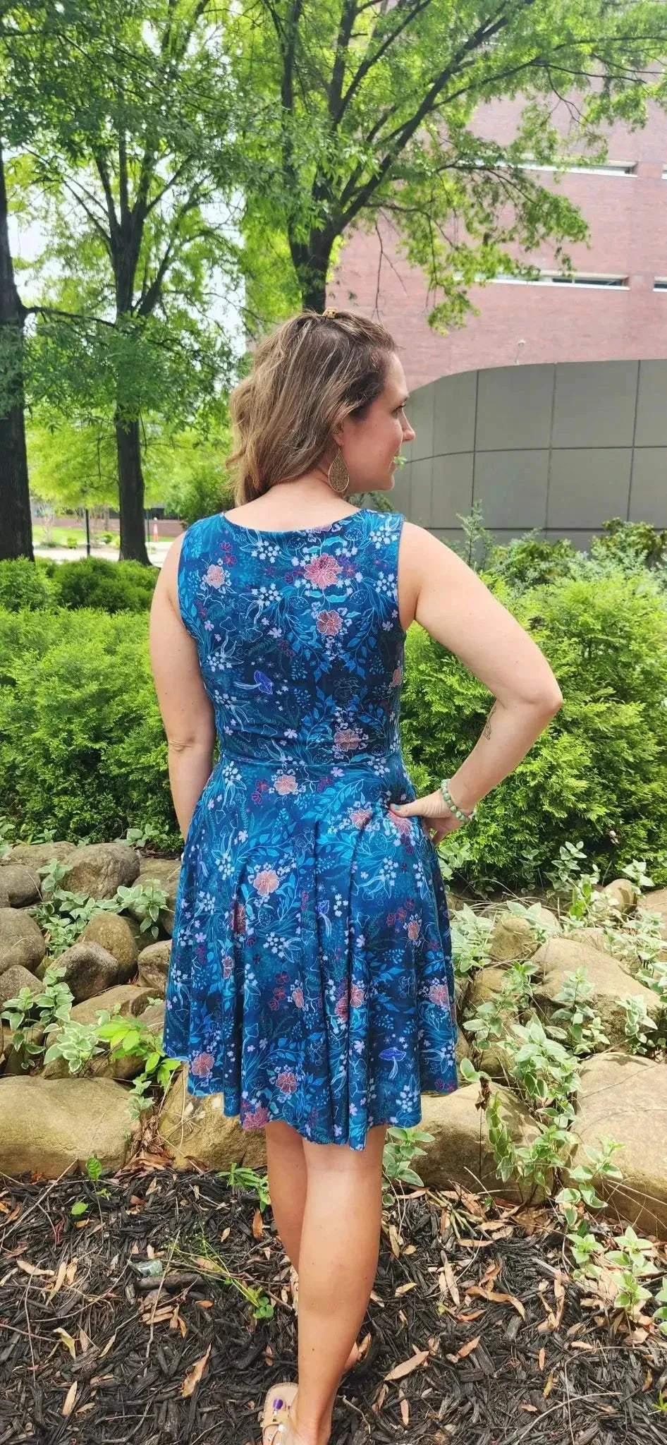 Teal woodland print fabric with enchanted glen design from WayMaker Fabrics.