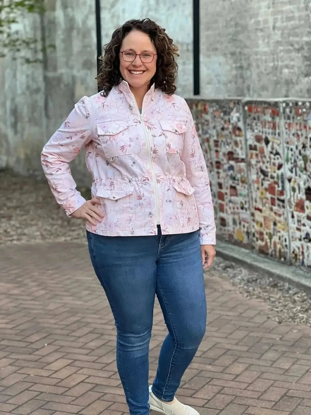 Peach fabric featuring a garden bees print from WayMaker Fabrics.