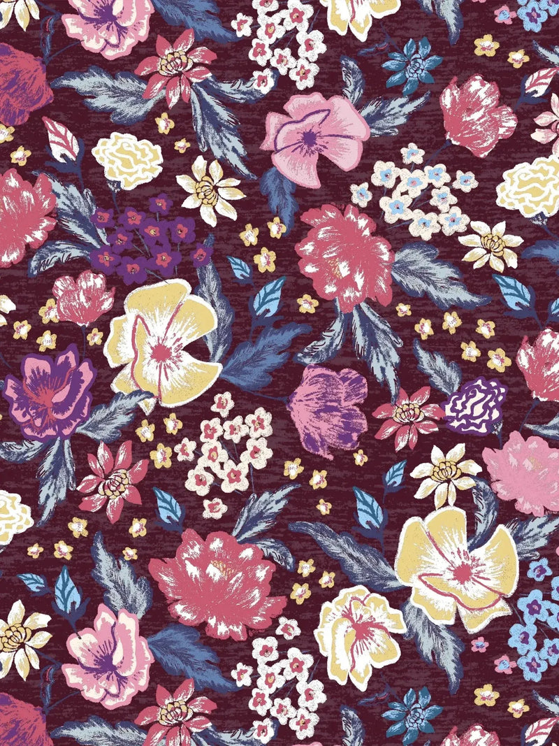 Maroon fabric with a vibrant floral pattern in various colors.