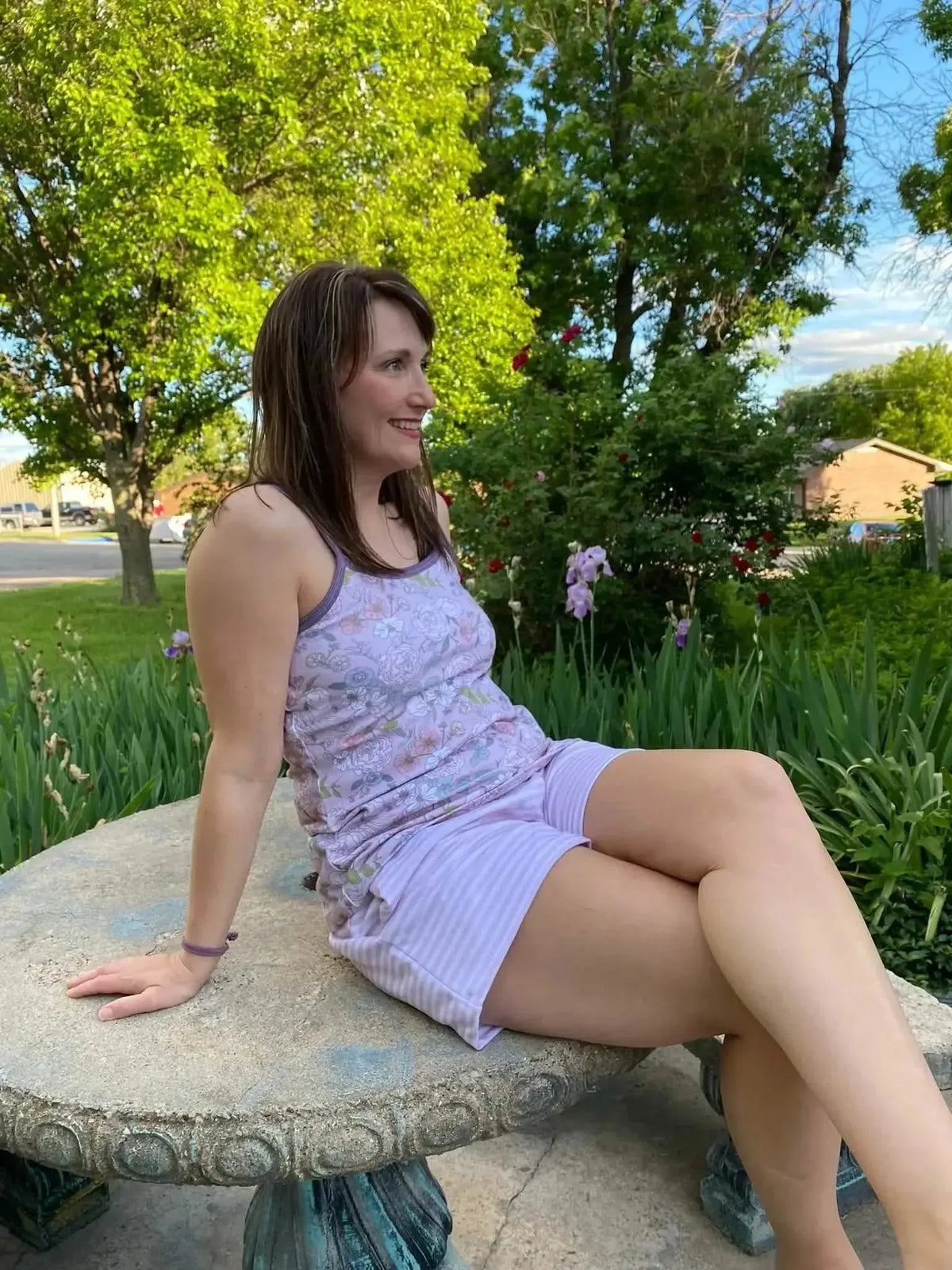 Mauve Japanese floral fabric with pink and purple blooms on a light background.