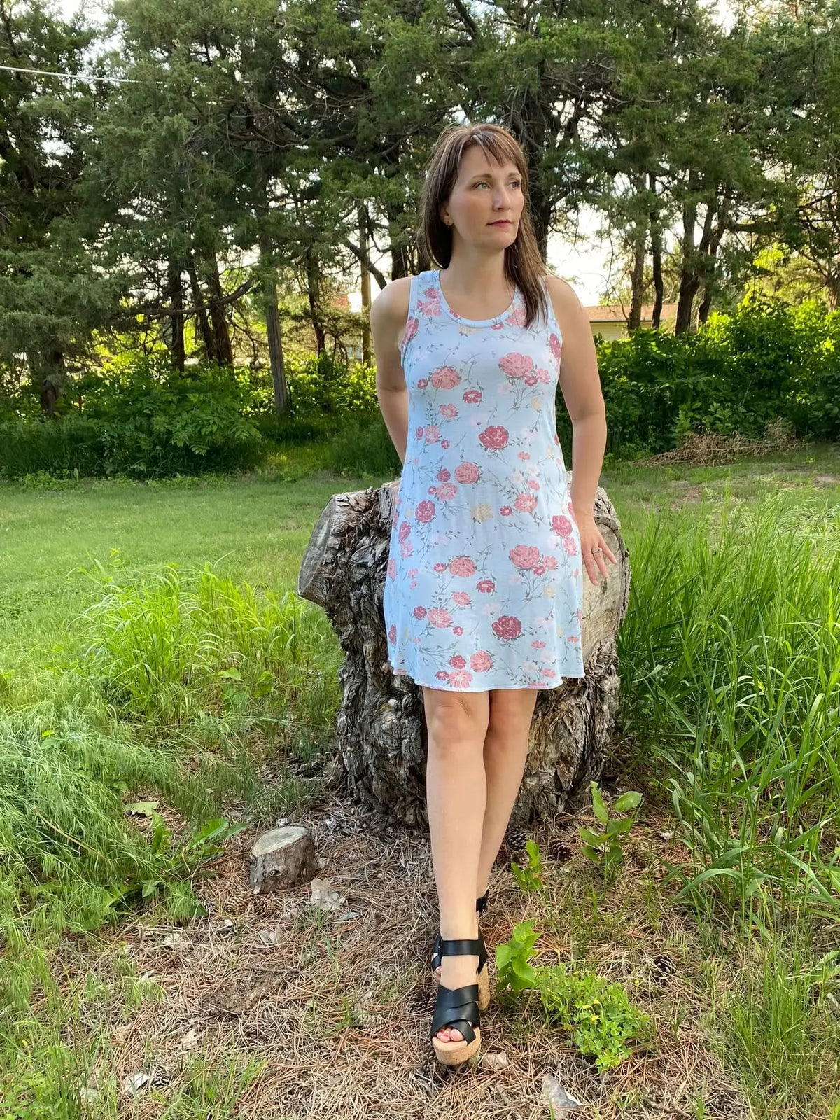 Modern Blooms floral print fabric with pink flowers on light background.