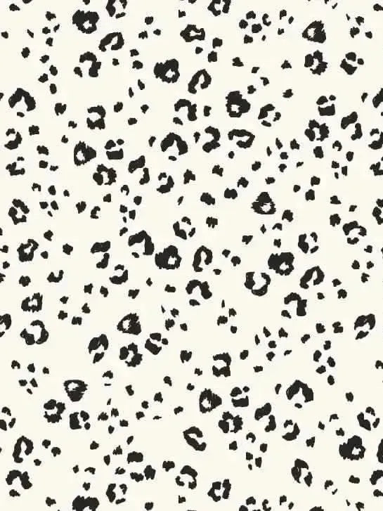 Mono leopard print fabric with black spots on a white background.