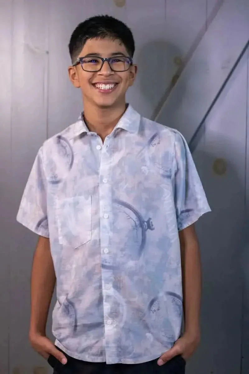 Blue celestial clock fabric with faith-based design on light background.