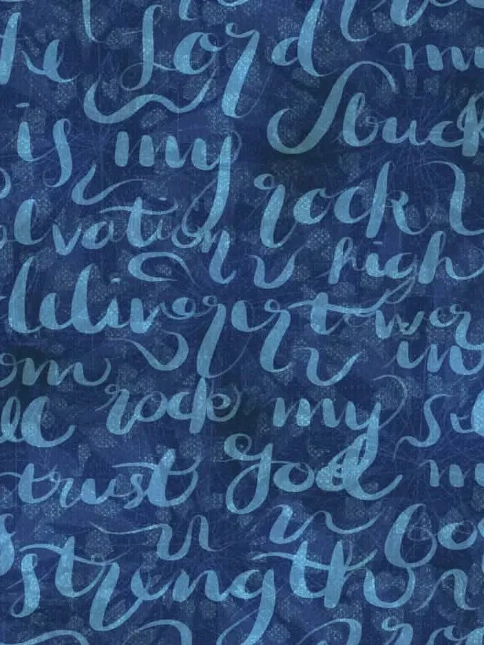 Blue fabric with light blue script text, "The Lord is my rock."